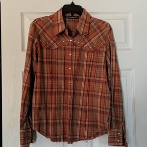 Vintage flannel.  Purchased at a western boutique.